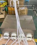Heavy Duty Four Head Peristaltic Pump Bottle Filler for Viscous Liquids and Thick Oils, showing digital interface and tubing.