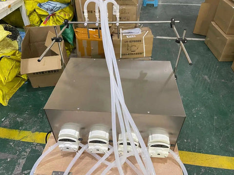 Heavy Duty Four Head Peristaltic Pump Bottle Filler for Viscous Liquids and Thick Oils, showing digital interface and tubing.