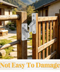 Top Tier Heavy Duty Stainless Steel Gate Hinge Hardware Pack Two Piece Wall Mount Set Comes Loaded With Solid Screws For Quick No Fuss Setup On Outdoor Yard Fences mounted on wooden fence with screws.
