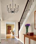 Eight Light Black Industrial Candle Chandelier For Dining Room And Kitchen Island in modern foyer setting