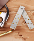 Stainless Steel Pivot Hinge System for Hidden Doors with tools on wooden surface, 360 degree rotatable, concealed hinges