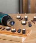 60 Piece Flap Wheel Sander Set for Dremel Rotary Tools, 80 Grit Aluminum Oxide Wheels With 1/8 Inch Shank displayed on wooden board
