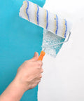 Set Of 3 Pro Grade Paint Rollers For Walls And House Painting with smooth even coverage on a turquoise wall.