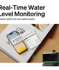 Smart Cat Water Fountain With App Monitoring And Stainless Steel Tray next to phone displaying low water alerts.