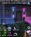 Exterior Double Up Down Outdoor Wall Lights With Remote Control illuminating a house facade in multiple colors, hand holding control.