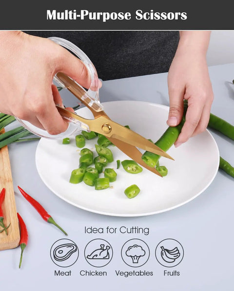 Gold Titanium Plated Kitchen Shears, 7.7 Inch Heavy Duty All Purpose Scissors For Meat, Poultry, And Everyday Kitchen Tasks, Stainless Steel With Acrylic Handle, Dishwasher Safe, Diamond Clear Finish cutting green chili on a plate