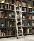 Library with wooden ladder, part of Heavy Duty Sliding Barn Door Track Kit 3.3ft To 20ft Wide Steel Round Tube Hardware Set