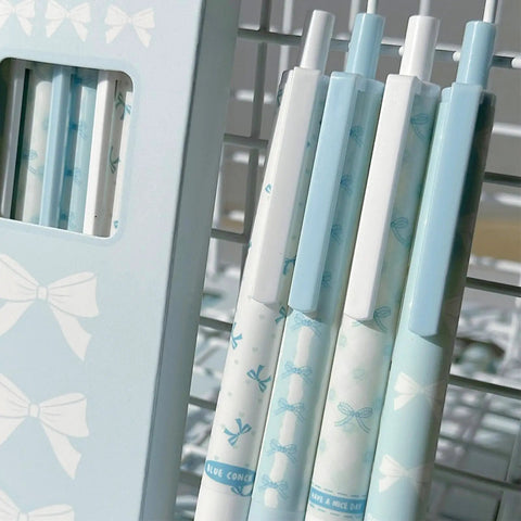 Close-up of 4 Pack Cute Bowknot Gel Pens Retractable 0.5mm Fine Point Black Ink Smooth Writing Office School Supplies Blue Cartoon Kawaii Pens