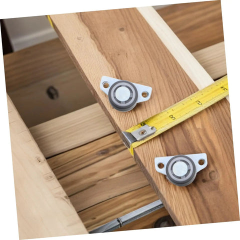 Heavy Duty 4 Pack Adjustable Sliding Door Roller Wheels Built Tough For Heavy Wooden Doors And Barn Hardware No Fuss Whisper Quiet Bearings Easy Closet Swap on wooden surface with measuring tape.