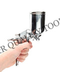 Slick Compact Spray Gun Airbrush Kit With A Hella Precise 0.5mm Nozzle And Super Comfy Ergonomic Trigger For Flawless Detail Painting And Crafts, held in hand.
