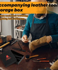 Man working on leather shoe with leather tool storage box on table