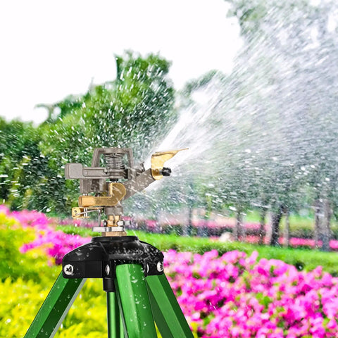 Impact Sprinkler On Tripod Base 2 Pack For Lawn Yard Garden With 360 Degree Coverage spraying water over bushes