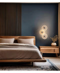 LMAPLUMP Wall Lamp Wall Sconce Modern Artistic Luxury Iron Textured Ripple Glass Light 3-Light Cluster LED in bedroom decor.