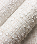 Close-up of Beige Grasscloth Peel And Stick Wallpaper Self Adhesive Vinyl For Walls 17.7 x 118.1 Inches showcasing water droplets on textured surface.