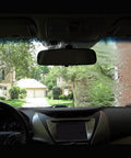 Car windshield showing Plastic Water Beading Spray delivers clear visibility on motorcycle windscreens, goggles, visors and boat windshields.
