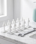 10 Piece Toilet Seat Bolt Kit With Plastic Screws Nuts And Washers on marble counter, includes wrench for installation.