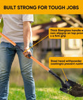 Heavy Duty Garden Shovel With 58 Inch Long Handle Round Point Steel Blade And Powder Coated Finish Orange Fiberglass Handle For Superior Leverage Back Saving Digging Workhorse For Tough Soil And Dense Dirt in use by person.