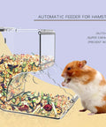 Big Time Clear Acrylic Automatic Hamster Feeder And Pet Food Dispenser For Small Critters, showing a hamster eating from inside.