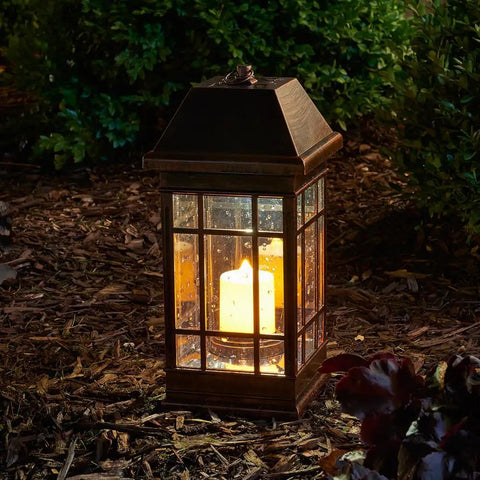 San Rafael II Solar Mission Lantern With Dual High Performance Warm White LEDs And Amber Pillar Accent in garden at night