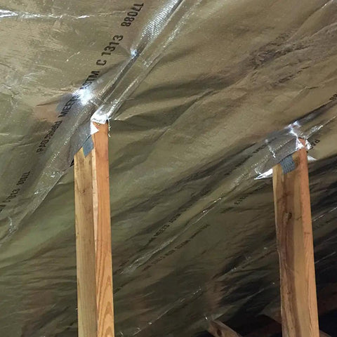Attic Radiant Barrier Shield 25.5 Inch Premium Single Layer Aluminum Foil With Reinforced Polyethylene installed on attic ceiling