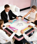 People playing with Two In One Non Slip Mahjong Racks With Pushers 4 Pack Clear Acrylic Pink Gift Set at a table