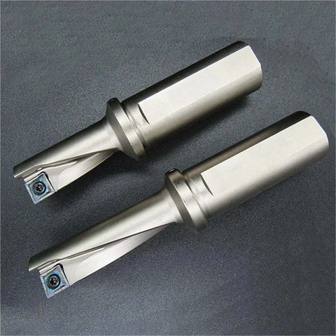 Two silver steel single-edge U-drill bits with carbide inserts and blue screws.