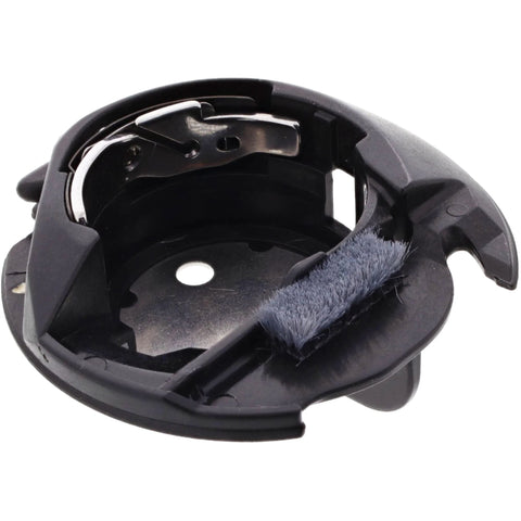 Bobbin case for sewing machines, black plastic with attached lint brush.