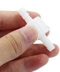White PVDF plastic 1/4-inch inline check valve with barbed ends.