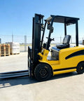 Shop Ready Heavy Duty Electric Forklift With Rapid Charge Battery And Smooth Four Way Steering Built Tough For The Daily Warehouse Grind And Hassle Free Freight Hauling, side view in warehouse.