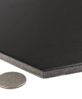 Close-up of Hex Black Porcelain Tile for Floor and Wall, Textured Glazed Hexagon Tile, eight and five eighths by nine and seven eighths inches
