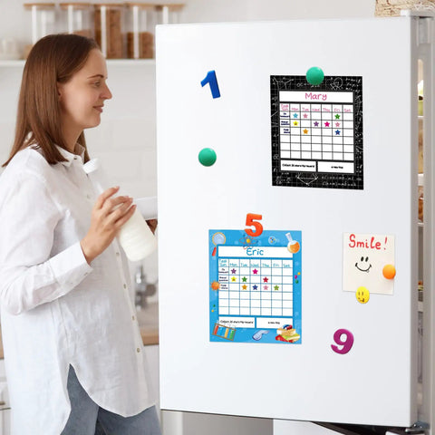 Teacher near fridge with Science Reward Chart Must Have Bundle For Classrooms With 80 Sheets And 2400 Star Stickers