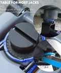 Rubber jack stand pads and adapters, 8-pack for universal frame rail pinch-weld protection; mounted on a jack.