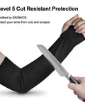 Person wearing Level 5 Cut Resistant Sleeves 2 Pack With Thumb Holes, 18 Inch Extra Long Arm Guards while holding a knife