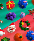 Colorful clay Christmas ornaments and decorations created with 70 Color Polymer Clay Kit With Oven Bake Clay For Kids And Adults Diy Sculpting Molding Clay Set With Tools And Jewelry Accessories Arts And Crafts Gift For Boys And Girls Safe Non Toxic Craft Kit.