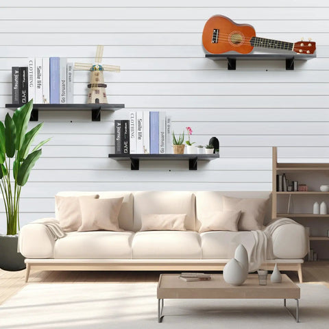 12 Inch Slatwall Shelf Bracket Heavy Duty Lip For Garage And Retail Displays Universal Slatwall Compatibility Fits Proslat Crownwall Garage Tek New Age Flow Wall Systems 16 Pack in living room with books and guitar displayed