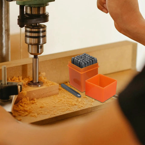 37 Piece Alphabet And Number Stamp Set With Heart Symbols For Imprinting On Metal Plastic Wood in use with drill press