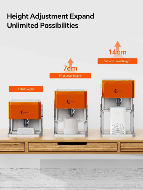Front view of three Carverall laser engravers with orange housings on a wooden desk.
