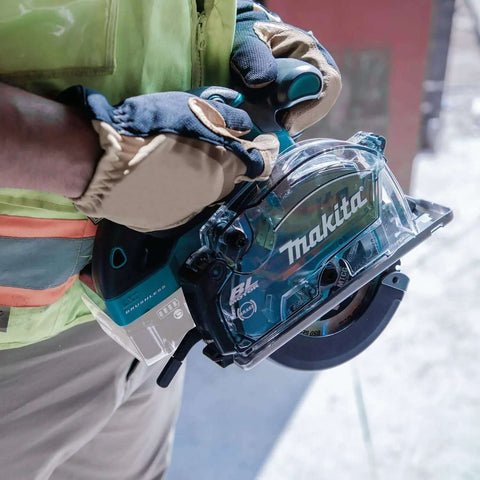 Worker holding 18V LXT Cordless Metal Cutting Saw Bare Tool with 5 3/8 inch cut capacity, ideal for cutting metal on job sites