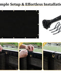 4 Foot By 25 Foot Fence Privacy Screen Heavy Duty 170 GSM HDPE Mesh UV Protected Weatherproof With Brass Grommets Black Binding And Double Reinforced Edges For Outdoor Wall Garden Yard Backyard Decor, shown in installation process with included zip ties.