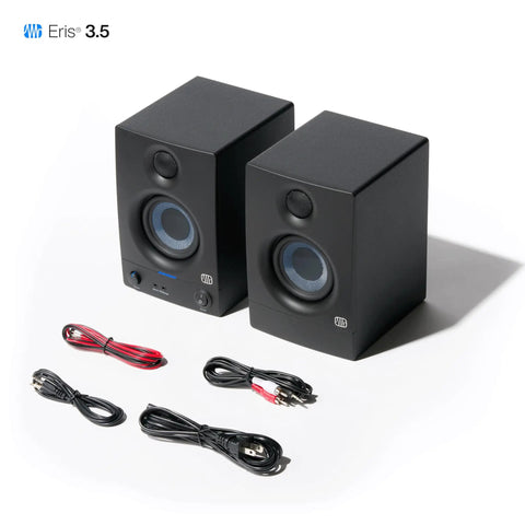 Eris 3.5 Studio Monitors Pair For Near Field Mixing And HiFi Desktop Listening with cables, showing front view of monitors.