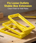 Single Gang Outlet Box Extender One Quarter Inch Snap On Wall Plate Gap Filler stacked yellow spacers on wooden surface for outlet leveling.