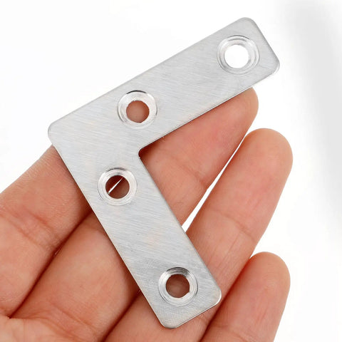 Close-up of 36 Piece Heavy Duty L Shaped Shelf Brackets Stainless Steel For Wall Mounted Shelves And Furniture Support in hand