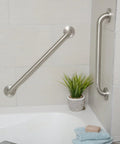 Bathroom with 16 inch stainless steel grab bar mounted diagonally and vertically near bathtub, ADA compliant, rust resistant, supports 500 pounds