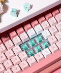 Beast Mode Ready Magnetic Jade Linear Keyboard Switches installed on pink and white gaming keyboard.