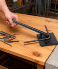 Heavy Duty Manual Rebar Bender, Portable Hand Held Steel Bar Bending Tool For 180 Degree Curve in use on wooden table.