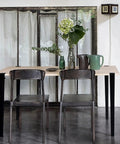 Built Tough As Nails Heavy Duty Table Legs, 28 Inch Adjustable F Shape Base, Black Finish under a light wood tabletop.