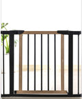 Rock Solid Wooden Dog Gate With Walk Through Swing For Indoor Puppy Protection And Pressure Mount Setup in view.