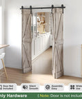 Installed 64-Inch Bi-Fold Sliding Barn Door Hardware Track Kit With Side Mounted Black J Shape Rollers, doors not included.