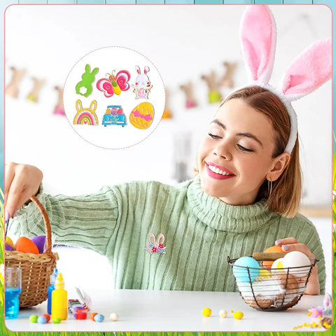 Woman wearing a bunny enamel pin from the Grab These Fresh Forty Piece Easter Enamel Pins Bulk Collection while decorating eggs.