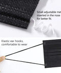 Close-up of black 3 ply face mask showing adjustable nose bridge and elastic ear loops for comfort, part of 100 pack black disposable face masks 3 ply breathable soft non woven masks with built in nose bridge and elastic ear loops for daily use all day comfort skin friendly protection for everyday wear.